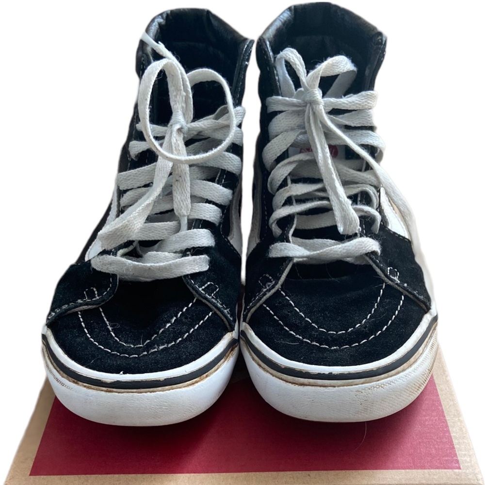 Vans high top.